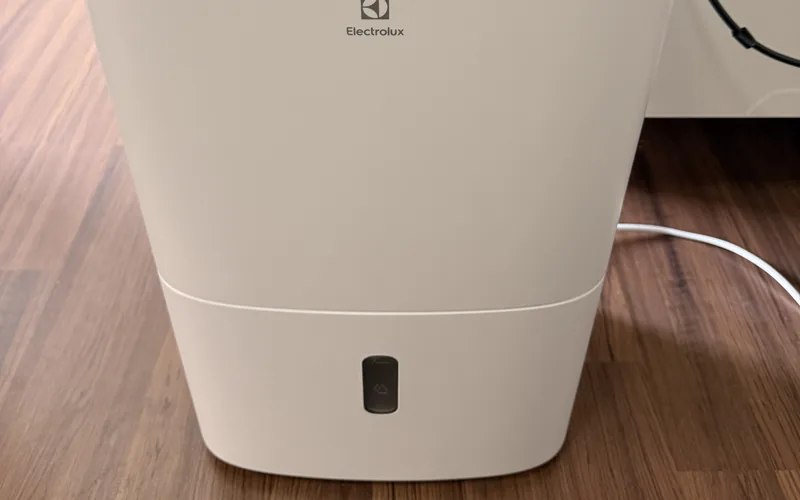 The base of a portable dehumidifier, where the removable water tank sits