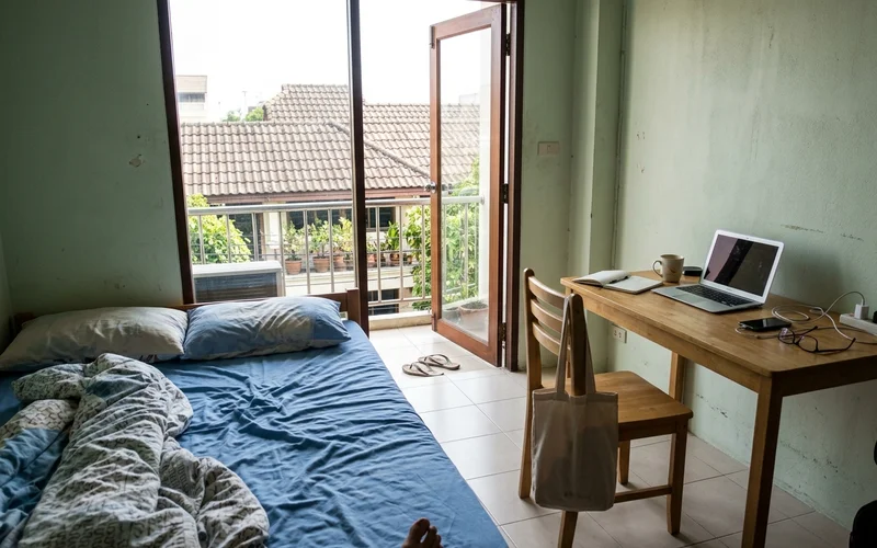 A simple furnished studio apartment interior in Chiang Mai