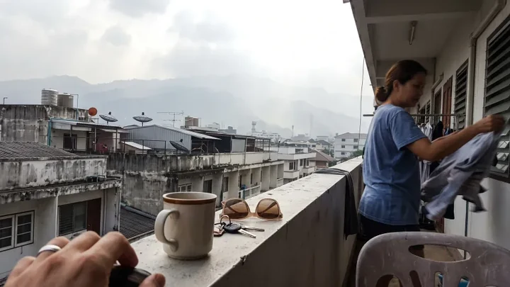 Hazy view across Chiang Mai during Burning Season with reduced visibility over the surrounding mountains