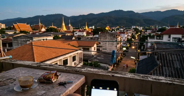 View across Chiang Mai rooftops toward Doi Suthep on a cool-season day
